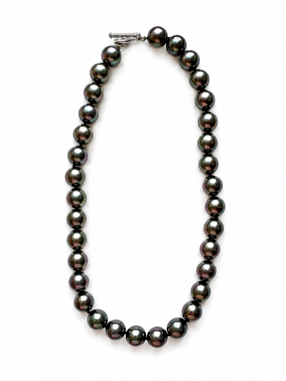 Tahitian Paul inspired strand.  Made from mother of Pearl shell